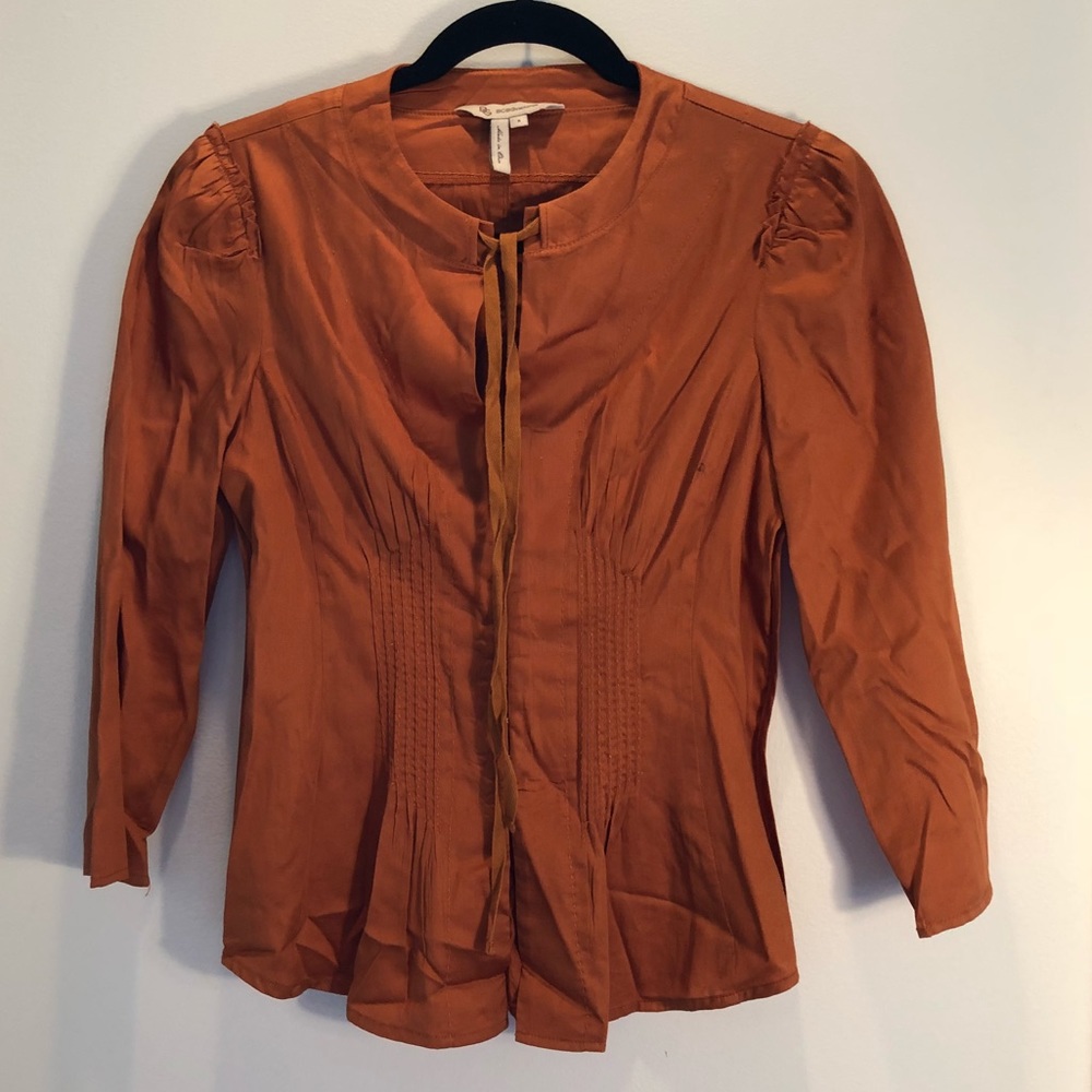 Burnt orange blouse